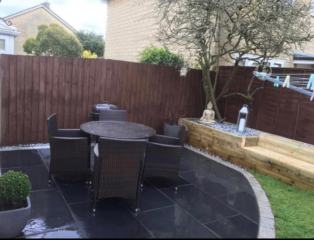 Gravel driveway with edge stones in New Malden